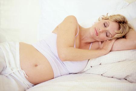 Kako spati med nosečnostjo