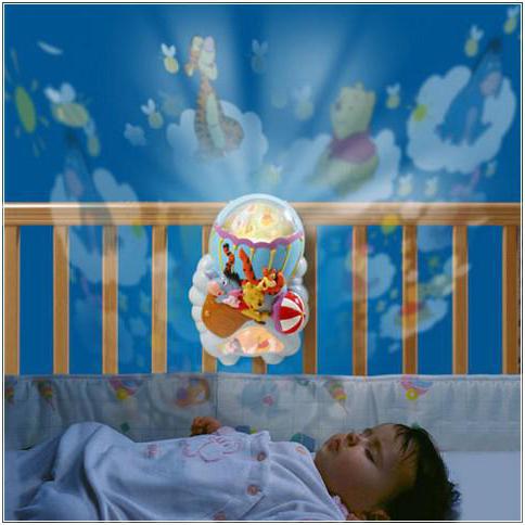 nočna svetloba za novorojenčke na postelji