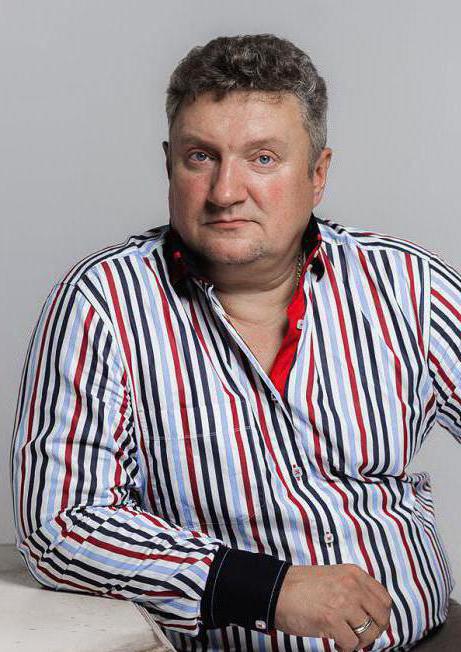 Олег Комаров биография