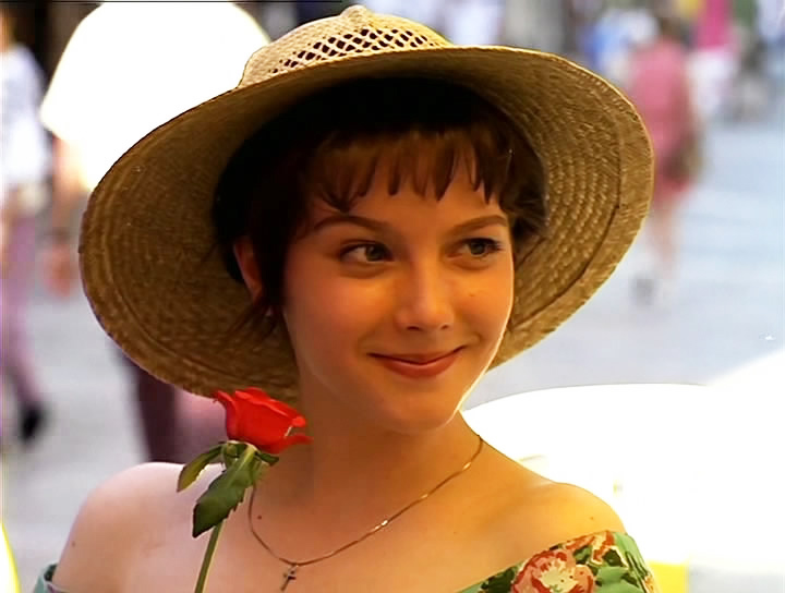 Olga con un fiore