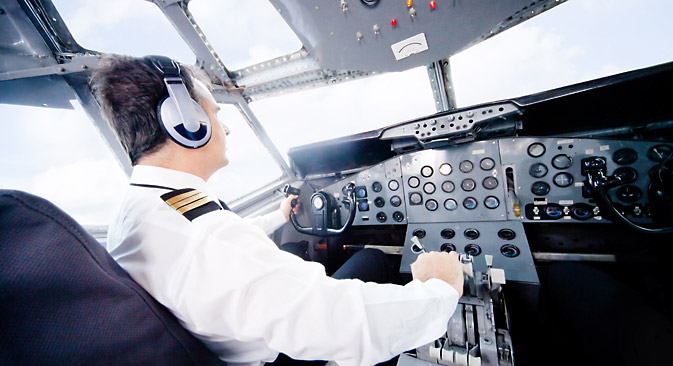 Pilot v pilotski kabini