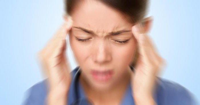 симптоми мигрене код жена