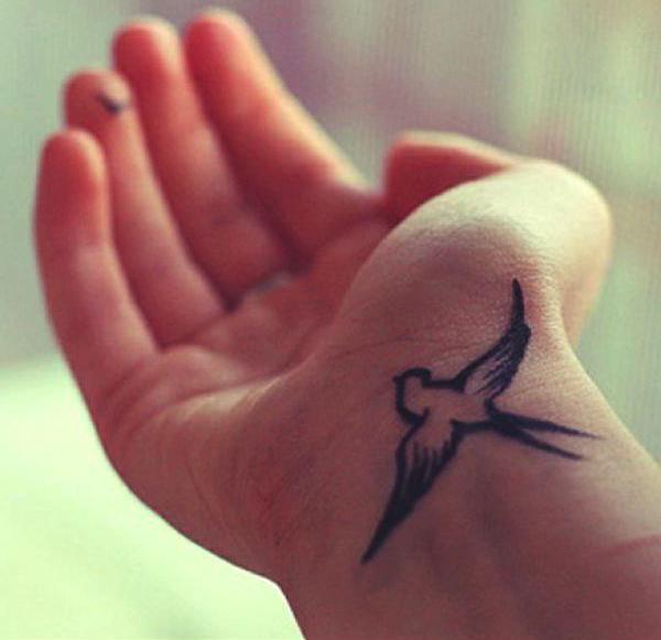 птици с ръце татуировка