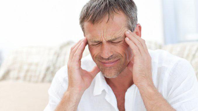 simptomi napetostnega glavobola