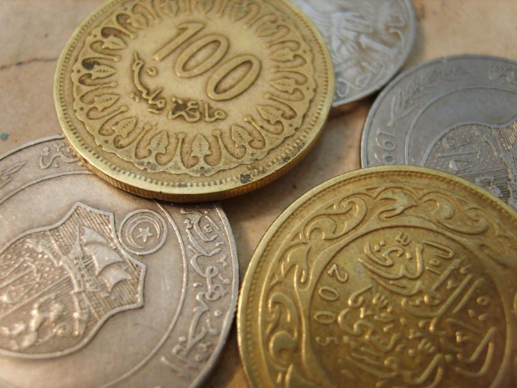 dinari e millime