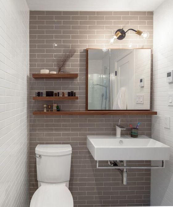 design di servizi igienici con lavabo e specchio