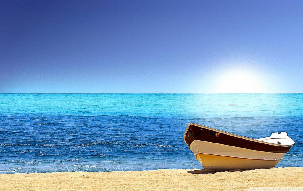 Morje, sonce in čoln